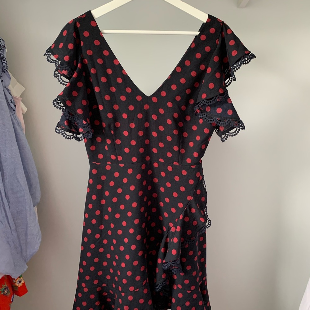 Red and navy polkadot deep V ruffle dress
